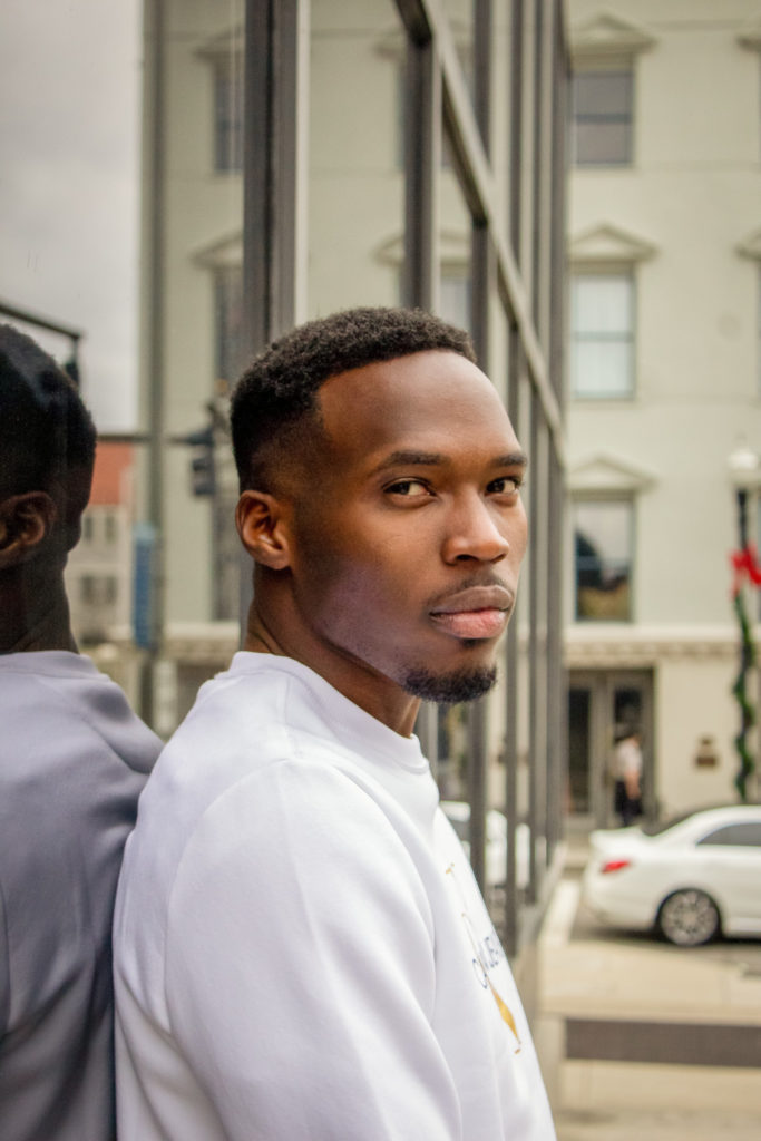 Senior college photos downtown Knoxville photo with African American graduate